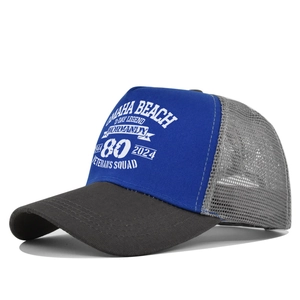 Detail of blue and gray trucker hat featuring Omaha Beach D-Day 80th anniversary print