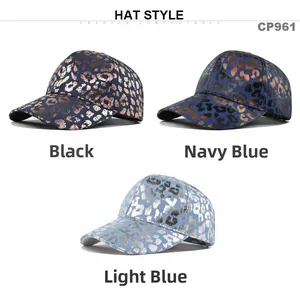 Three leopard print baseball caps in black, navy blue, and light blue with metallic finish