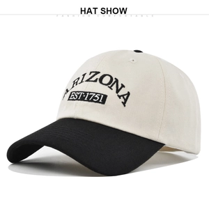 Detailed close-up of Arizona embroidery on a two-tone cotton baseball cap