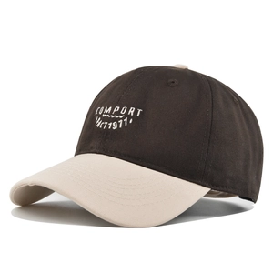 Macro detail of COMPORT 1971 embroidery on premium cotton twill baseball cap