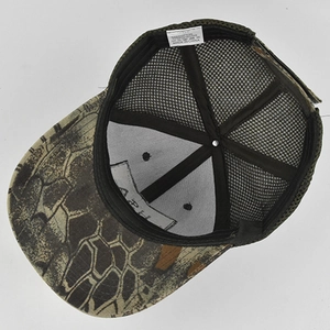 Close-up of camo trucker hat interior featuring mesh design and cotton-polyester material