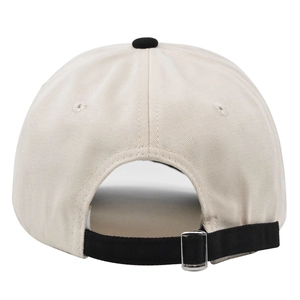Detail view of cotton baseball cap back with metal adjustable buckle and beige fabric