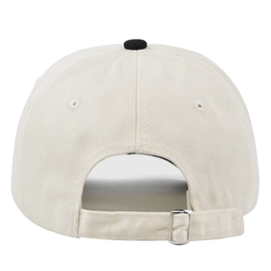 Close-up of beige baseball cap back with adjustable metal buckle and cotton twill fabric