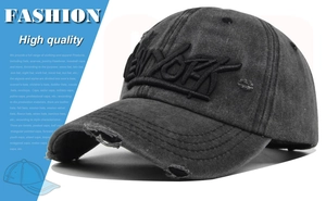 Detailed close-up of 3D New York embroidery on vintage washed distressed baseball cap
