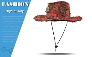 Detail view of red western cowboy hat with distressed fabric and sheriff star badge