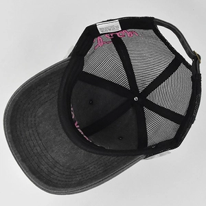 Detail of vintage New York trucker hat with cotton polyester blend washing label info