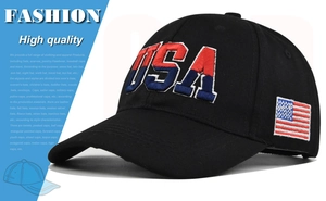 Detail of 3D USA embroidery and American flag patch on a black cotton baseball cap