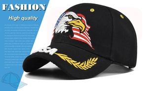 Close-up of eagle embroidery and USA lettering on a black cotton twill baseball cap