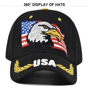 Detail of 3D USA embroidery and eagle patch on a black cotton baseball cap