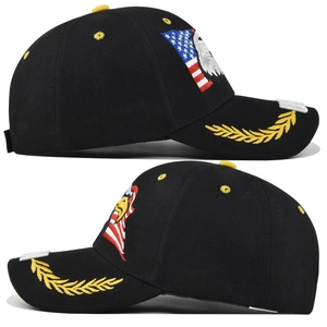 Detail of embroidered eagle and USA flag on side of black cotton baseball cap