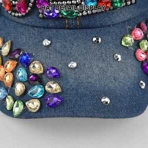 Blue denim baseball cap decorated with colorful rhinestones and silver metal rivets
