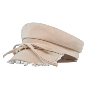 Close-up detail of beige baker boy hat featuring white lace trim and bow ribbon accent