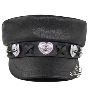 Punk style black faux leather newsboy cap with metallic rings and purple heart patch
