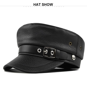 Close-up of black PU leather flat-top naval hat with metal buckles and textured finish