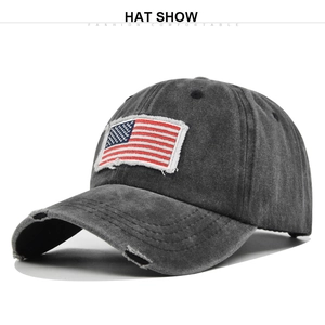 Detail showing vintage washed charcoal grey baseball cap with American flag patch embroidery