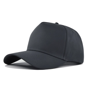 Detailed view of 5-panel solid black baseball cap showing reinforced stitching and curved brim