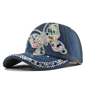 Sparkling denim baseball cap with rhinestone butterfly motif and studded brim design