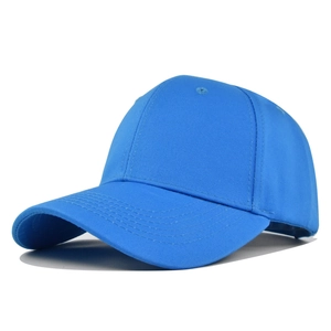 Close-up of bright blue cotton baseball cap with six-panel construction and curved brim