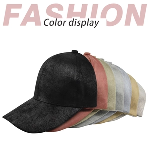 Multiple colors of suede baseball caps arranged in a stylish overlapping row display