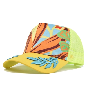 Tropical mesh trucker hat with yellow brim, blue leaf embroidery and floral print