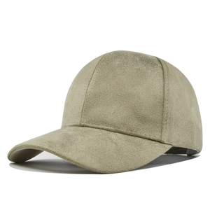 Detail of light olive suede baseball cap showing premium matte texture and stitching