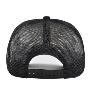 Detail view of the breathable mesh back and adjustable plastic snap closure of the black trucker hat