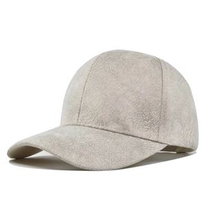 Detailed macro view of the minimalist light grey suede texture on a blank baseball cap