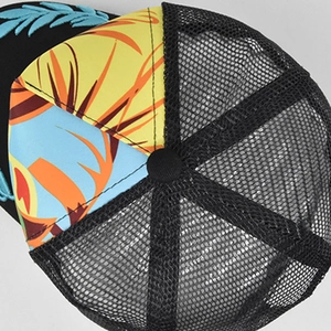 Detail of breathable black mesh and tropical leaf pattern on mesh trucker hat
