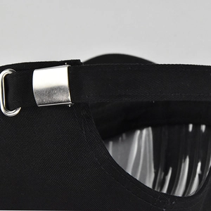 Detail of adjustable silver metal buckle on black cotton twill baseball cap with neat stitching