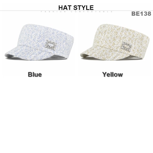 Detail view of floral flat top hats with rhinestone buckles in blue and yellow colors