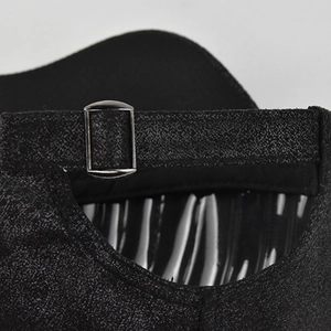 Detail of adjustable silver metal buckle and black suede texture on baseball cap strap