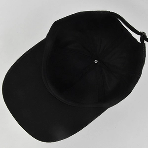Detail view of the black baseball cap interior showing sewing and adjustable strap