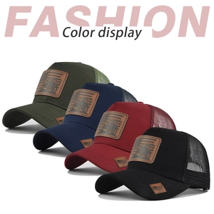 Detail view of mesh trucker hats in four colors with leather tractor flag patches