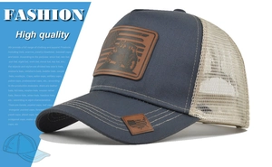 Detail of the vintage American flag and off-road leather patch on the trucker hat