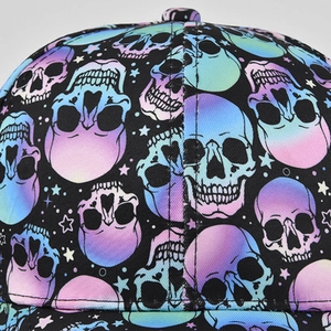 Detail showing the colorful skull print and stitching on the baseball cap