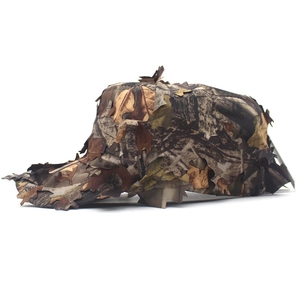 Detailed side view of 3D leaf camouflage hunting hat with realistic jungle foliage pattern