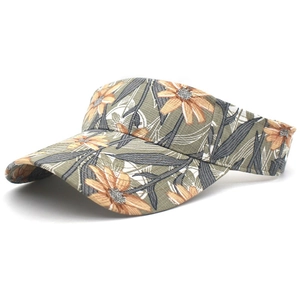 Detail view of the floral print sun visor hat with olive green and orange flower patterns
