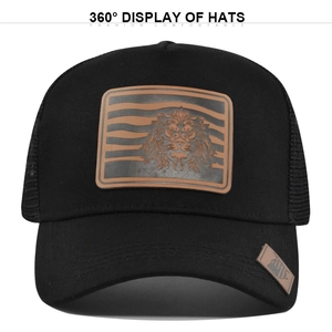 Black mesh trucker hat with brown leather lion patch and curved brim for sun protection