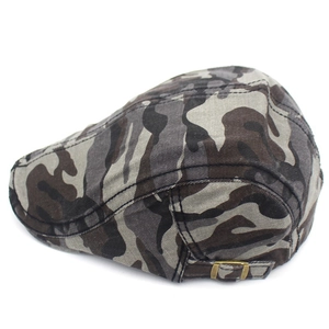 Detail view of the vintage camo beret featuring adjustable bronze metal buckles and canvas