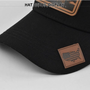 Black cotton baseball cap with American flag leather patch and reinforced brim stitching