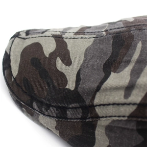 Macro detail of camouflage beret showing twill cotton fabric and double-stitched seams