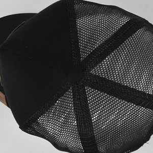 Close-up of black breathable mesh and crown detail of the lion baseball trucker cap