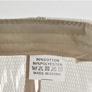 Detail showing inner wash label with 50% cotton and 50% polyester material info