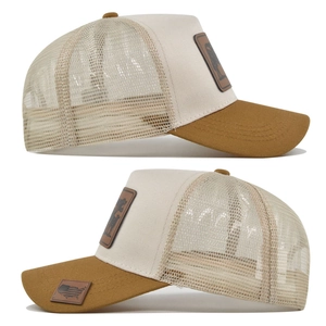 Detailed side profile of a breathable mesh trucker hat with decorative animal patch