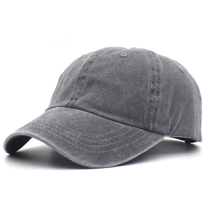 Close-up of a dark grey washed cotton baseball cap with vintage finish and stitching