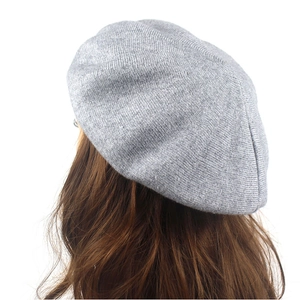 Classic grey knitted wool beret for women, warm winter hat with a soft texture
