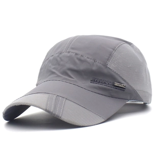 Detail of grey quick-dry sport cap featuring breathable mesh panels and side printing
