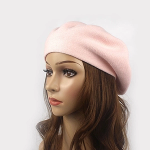 Pink knit wool beret for women with a warm minimalist round crown design