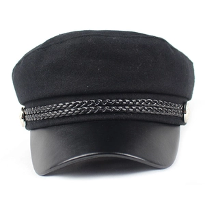 Classic black baker boy hat with leather brim and braided cord detail on white background