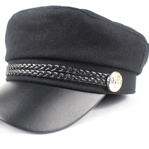 Classic black military cap with leather brim and braided cord for a retro fashion look